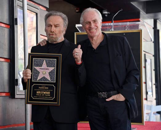 Italian actor Franco Nero is joined by US actor Keith Carradine during an unveiling ceremony honoring him with the 2,835th star on the Hollywood Walk of Fame in Los Angeles on Thursday, February 12, 2026.  LAP2026021204 JIMxRUYMEN