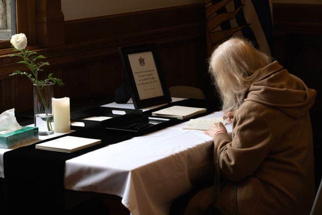 February 12, 2026, Victoria, Bc, CAN: A woman signs a book of condolences in honour of the victims of the Tumbler Ridge, B.C., tragedy as the province declares the day as a day of mourning at the legislature in Victoria, on Thursday, Feb. 12, 2026. Victoria CAN  - ZUMAc35_ 20260212_zaf_c35_269 Copyright: xChadxHipolitox