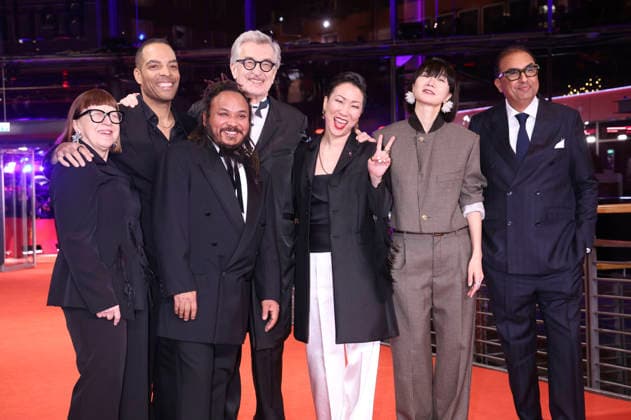 Ewa Puszczynska, Reinaldo Marcus Green, Min Bahadur Bham, Wim Wenders, Hikari, Bae Doona and Shivendra Singh Dungarpur at the festival opening with the premiere of the feature film No Good Men at the Berlinale 2026 76 Berlin International Film Festival in the Berlinale Palast Berlin, 12 02 2026 Foto:xD.xBedrosianx xFuturexImagex opening_6444