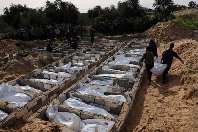 53 unidentified Palestinians laid to rest in mass grave in Gaza’s Deir al-Balah DEIR AL-BALAH, GAZA - FEBRUARY 13: Remains of 53 unidentified Palestinians, who lost their lives following Israeli attacks on the Gaza Strip and were recently handed over, are buried in a mass grave in Deir al-Balah, Gaza, on February 13, 2026. Abdalhkem Abu Riash Anadolu Deir al-Balah Gaza. Editorial use only. Please get in touch for any other usage.  Copyright: x2026xAnadoluxAbdalhkemxAbuxRiashx