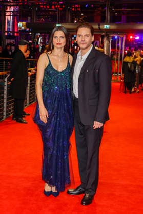 Felicitas Rombold and Daniel Bruehl at the opening of the 75th Berlin International Film Festival in the Berlinale Palast at Potsdamer Platz