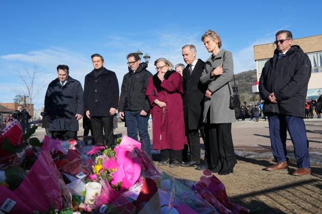 February 13, 2026, Tumbler Ridge, Bc, CANADA: NDP interim Leader Don Davies, from left, Conservative Leader Pierre Poilievre, MP Bob Zimmer, Green Party Leader Elizabeth May, Prime Minister Mark Carney and his wife Diana Fox Carney, and Bloc Quebecois Leader Yves-Francois Blanchet attend a memorial for the victims of a mass shooting, in Tumbler Ridge, B.C., Friday, Feb. 13, 2026. Tumbler Ridge CANADA - ZUMAc35_ 20260213_zaf_c35_109 Copyright: xChristinnexMuschix