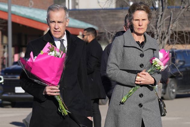 February 13, 2026, Tumbler Ridge, Bc, CANADA: Prime Minister Mark Carney and his wife Diana Fox Carney arriver at a memorial for the victims of a mass shooting, in Tumbler Ridge, B.C., Friday, Feb. 13, 2026. Tumbler Ridge CANADA  - ZUMAc35_ 20260213_zaf_c35_114 Copyright: xChristinnexMuschix