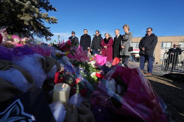 February 13, 2026, Tumbler Ridge, Bc, CANADA: NDP interim Leader Don Davies, from left, Conservative Leader Pierre Poilievre, MP Bob Zimmer, Green Party Leader Elizabeth May, Prime Minister Mark Carney and his wife Diana Fox Carney, and Bloc Quebecois Leader Yves-Francois Blanchet attend a memorial for the victims of a mass shooting, in Tumbler Ridge, B.C., Friday, Feb. 13, 2026. Tumbler Ridge CANADA - ZUMAc35_ 20260213_zaf_c35_112 Copyright: xChristinnexMuschix