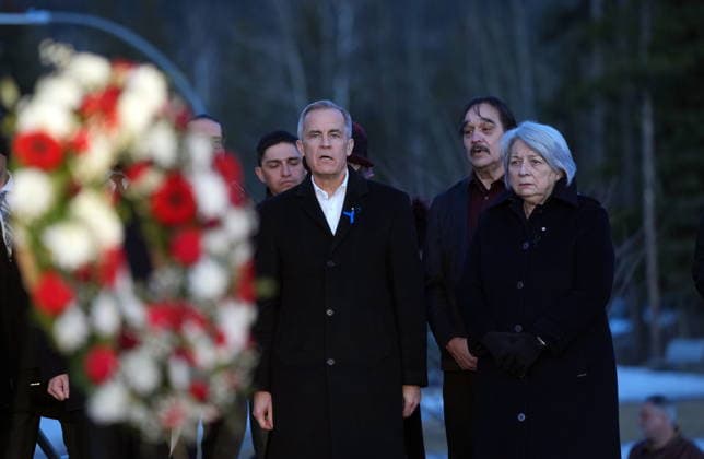 February 13, 2026, Tumbler Ridge, Bc, CANADA: Prime Minister Mark Carney and Governor General Mary Simon sing O Canada at a vigil for the victims of a mass shooting, in Tumbler Ridge, B.C., Friday, Feb. 13, 2026. Tumbler Ridge CANADA  - ZUMAc35_ 20260213_zaf_c35_160 Copyright: xChristinnexMuschix