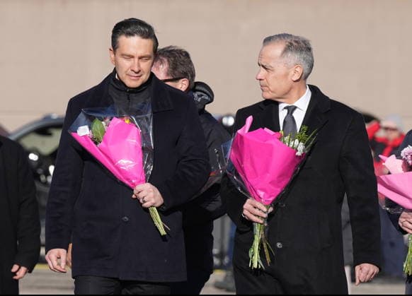 February 13, 2026, Tumbler Ridge, British Columbia, Canada: Prime Minister MARK CARNEY, right, and Conservative Leader PIERRE POILIEVRE arrive at a memorial for the victims of a mass shooting, in Tumbler Ridge. Tumbler Ridge Canada  - ZUMAc35_ 20260213_zaf_c35_113 Copyright: xChristinnexMuschix