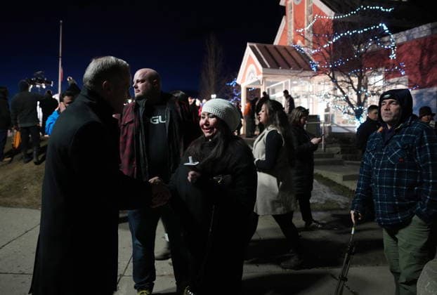 February 13, 2026, Tumbler Ridge, Bc, CANADA: Prime Minister Mark Carney speaks with people attending a vigil for the victims of a mass shooting, in Tumbler Ridge, B.C., Friday, Feb. 13, 2026. Tumbler Ridge CANADA  - ZUMAc35_ 20260213_zaf_c35_178 Copyright: xChristinnexMuschix