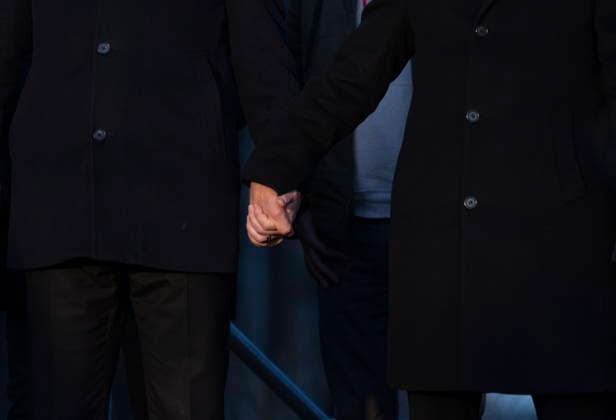 February 13, 2026, Tumbler Ridge, Bc, CANADA: Prime Minister Mark Carney, right, and Conservative Leader Pierre Poilievre join hands while attending a vigil for the victims of a mass shooting, in Tumbler Ridge, B.C., Friday, Feb. 13, 2026. Tumbler Ridge CANADA - ZUMAc35_ 20260213_zaf_c35_185 Copyright: xChristinnexMuschix