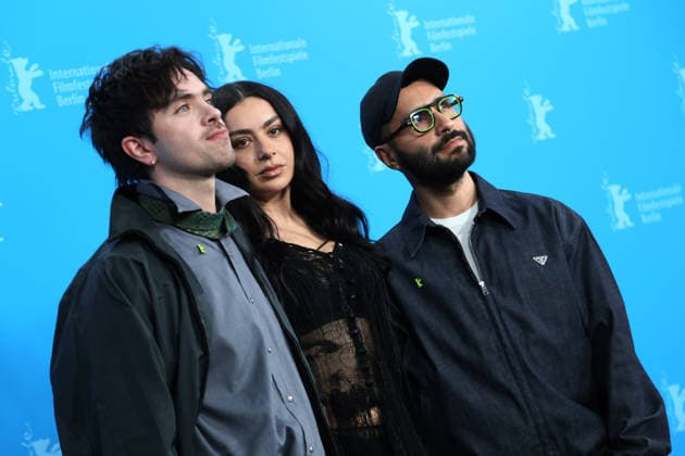 February 14, 2026, Berlin, Germany: British singer-songwriter and actress CHARLI XCX (C), Scottish Director Aidan Zamiri (L), and US producer David Hinojosa pose for photographers at the photo call for the film The Moment during the the 76th Berlin International Film Festival (Berlinale), which is Europe s first major film festival of the year, in Berlin. The festival runs from February 12 to 22, 2026. Berlin Germany  - ZUMAf146 20260214_zip_f146_086 Copyright: xRouzbehxFouladix
