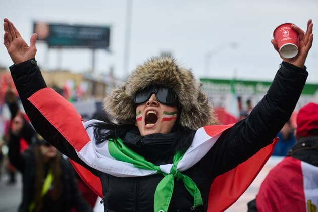 February 14, 2026, Toronto, On, Canada: Protesters march in support of regime change in Iran during a demonstration in Toronto, on Saturday, Feb. 14, 2026. Toronto Canada  - ZUMAc35_ 20260214_zaf_c35_101 Copyright: xSammyxKoganx