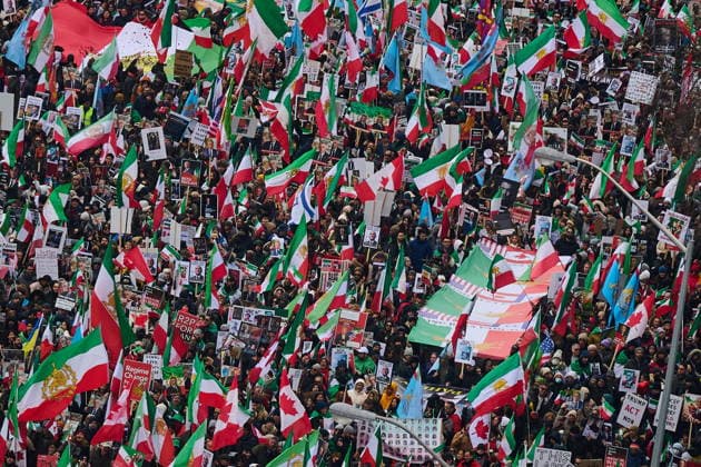 February 14, 2026, Toronto, On, Canada: Protesters march in support of regime change in Iran during a demonstration in Toronto, on Saturday, Feb. 14, 2026. Toronto Canada  - ZUMAc35_ 20260214_zaf_c35_104 Copyright: xSammyxKoganx