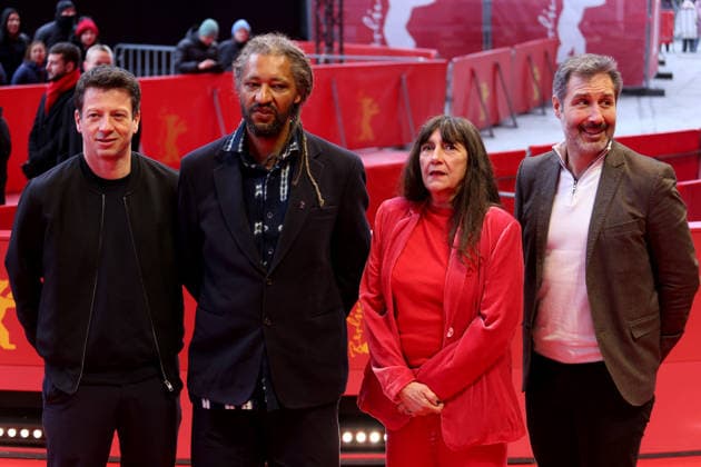 February 14, 2026, Berlin, Germany: Alain Gomis (2L) and guest attends the red carpet for the film Dao premiere during the 76th Berlin International Film Festival (Berlinale), which is Europe s first major film festival of the year, in Berlin. The festival runs from February 12 to 22, 2026. Berlin Germany  - ZUMAf146 20260214_zip_f146_103 Copyright: xRouzbehxFouladix