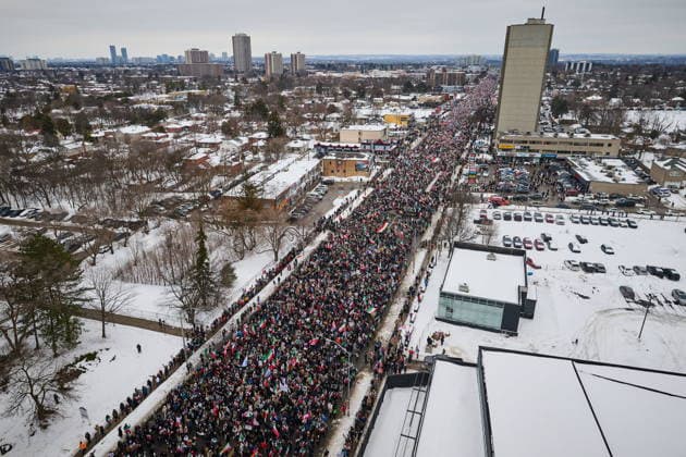 February 14, 2026, Toronto, On, Canada: Protesters march in support of regime change in Iran during a demonstration in Toronto, on Saturday, Feb. 14, 2026. Toronto Canada  - ZUMAc35_ 20260214_zaf_c35_106 Copyright: xSammyxKoganx