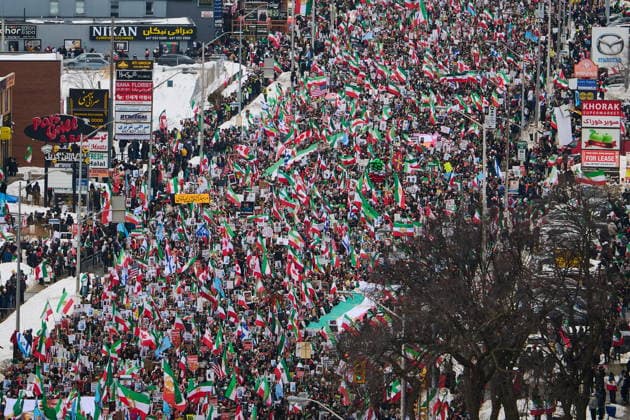 February 14, 2026, Toronto, On, Canada: Protesters march in support of regime change in Iran during a demonstration in Toronto, on Saturday, Feb. 14, 2026. Toronto Canada  - ZUMAc35_ 20260214_zaf_c35_107 Copyright: xSammyxKoganx