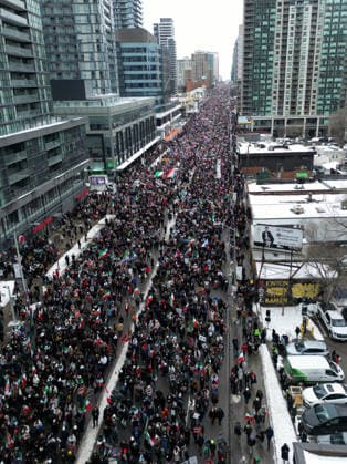 Thousands march in Toronto in support of regime change in Iran TORONTO, CANADA - FEBRUARY 14 : An aerial view of thousands attending a rally at Yonge Street against Iranian regime on February 14, 2026 in Toronto, Ontario, Canada. Toronto Police warned of ‘extreme traffic and transit delays with attendance of as many as 200,000 people . Protesters waving flags and chanting slogans in solidarity with the Iranian people, marched along Yonge Street in North York within ‘Global Day of Action’. Mert Alper Dervis Anadolu Ontario Canada. Editorial use only. Please get in touch for any other usage.  Copyright: x2026xAnadoluxMertxAlperxDervisx
