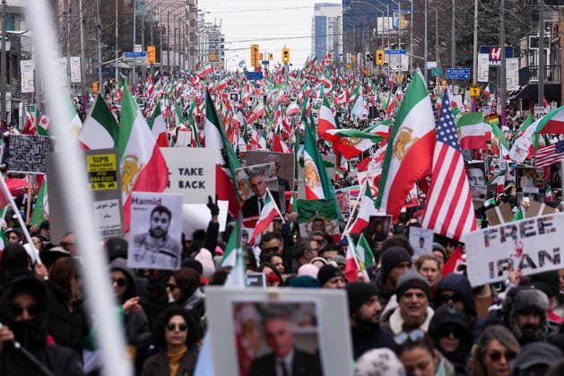 Thousands march in Toronto in support of regime change in Iran TORONTO, CANADA - FEBRUARY 14 : Thousands of protestors attend a rally at Yonge Street against Iranian regime on February 14, 2026 in Toronto, Ontario, Canada. Toronto Police warned of ‘extreme traffic and transit delays with attendance of as many as 200,000 people . Protesters waving flags and chanting slogans in solidarity with the Iranian people, marched along Yonge Street in North York within ‘Global Day of Action’. Mert Alper Dervis Anadolu Ontario Canada. Editorial use only. Please get in touch for any other usage.  Copyright: x2026xAnadoluxMertxAlperxDervisx
