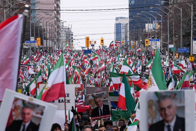 Thousands march in Toronto in support of regime change in Iran TORONTO, CANADA - FEBRUARY 14 : Thousands of protestors attend a rally at Yonge Street against Iranian regime on February 14, 2026 in Toronto, Ontario, Canada. Toronto Police warned of ‘extreme traffic and transit delays with attendance of as many as 200,000 people . Protesters waving flags and chanting slogans in solidarity with the Iranian people, marched along Yonge Street in North York within ‘Global Day of Action’. Mert Alper Dervis Anadolu Ontario Canada. Editorial use only. Please get in touch for any other usage.  Copyright: x2026xAnadoluxMertxAlperxDervisx