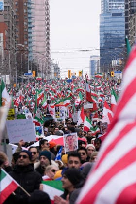 Thousands march in Toronto in support of regime change in Iran TORONTO, CANADA - FEBRUARY 14 : Thousands of protestors attend a rally at Yonge Street against Iranian regime on February 14, 2026 in Toronto, Ontario, Canada. Toronto Police warned of ‘extreme traffic and transit delays with attendance of as many as 200,000 people . Protesters waving flags and chanting slogans in solidarity with the Iranian people, marched along Yonge Street in North York within ‘Global Day of Action’. Mert Alper Dervis Anadolu Ontario Canada. Editorial use only. Please get in touch for any other usage.  Copyright: x2026xAnadoluxMertxAlperxDervisx