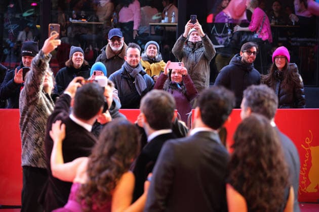 February 15, 2026, Berlin, Germany: Team of Salvation movie takes a selfie on the red carpet for the film Salvation at the 76th Berlin International Film Festival (Berlinale), which is Europe s first major film festival of the year, in Berlin. The festival runs from February 12 to 22, 2026. Berlin Germany - ZUMAf146 20260215_zip_f146_150 Copyright: xRouzbehxFouladix