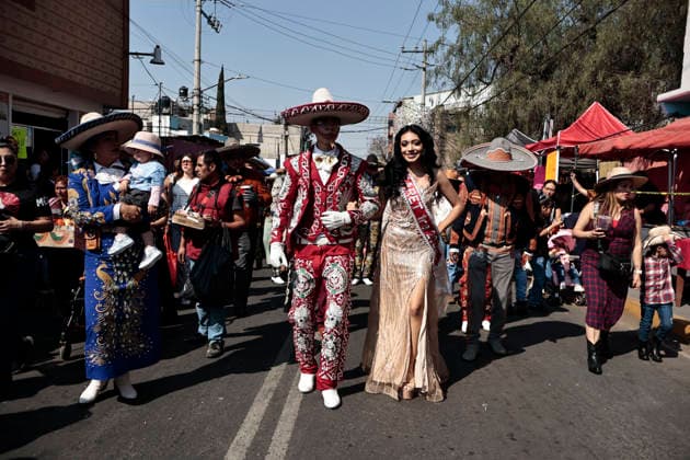 February 15, 2026, Mexico City, Cdmx, Mexico: The Santa Martha Acatitla Carnival kicked off this weekend, ahead of Holy Week celebrations in the Iztapalapa region, home to one of the world s most important carnival reenactments. These carnivals originated as a form of rebellion by enslaved people against the Spanish. These enslaved people, originally from the town of Acatitla, wore allegorical clothing, shoes, and masks with European features to mock those who oppressed them and violently imposed their religion. Through the streets of this region, they dance to orchestral music, dressed in charro suits made and embroidered by hand with gold thread and decorations featuring traditional figures. The charro women wear skirts, boots, and hats t - ZUMAp204 20260215_zip_p204_020 Copyright: xJosuexPerezx