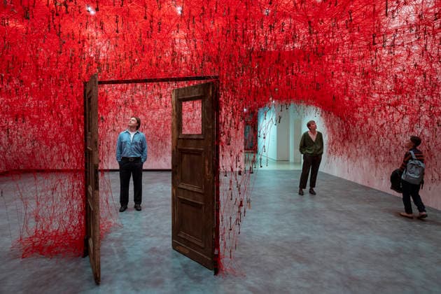 February 16, 2026, London, London, UK: LONDON, UK. Staff members with Ã¢â‚¬ËœThreads of LifeÃ¢â‚¬â ¢, 2026, at a preview of Chiharu Shiota: Threads of Life, a new exhibition by Japanese performance and installation artist Chiharu Shiota at the Hayward Gallery presenting her iconic floor-to-ceiling weblike works made of red, white and black thread. The show runs 17 February to 3 May 2026. London UK  - ZUMAl94_ 20260216_zaf_l94_003 Copyright: xStephenxChungx