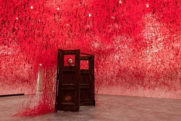 February 16, 2026, London, England, United Kingdom: A staff member looks at an art installation titled Threads of Life , 2026, by Chiharu Shiota during a photocall at the Hayward Gallery ahead of the first major solo London exhibition titled Threads of Life of the Berlin-based Japanese artist. London United Kingdom  - ZUMAs371 20260216_zip_s371_010 Copyright: xWiktorxSzymanowiczx