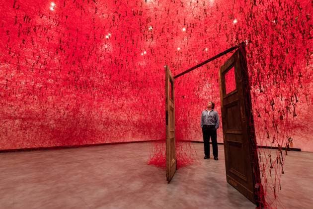 February 16, 2026, London, England, United Kingdom: A staff member looks at an art installation titled Threads of Life , 2026, by Chiharu Shiota during a photocall at the Hayward Gallery ahead of the first major solo London exhibition titled Threads of Life of the Berlin-based Japanese artist. London United Kingdom - ZUMAs371 20260216_zip_s371_011 Copyright: xWiktorxSzymanowiczx
