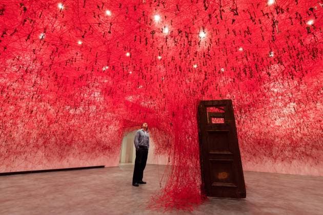 February 16, 2026, London, England, United Kingdom: A staff member looks at an art installation titled Threads of Life , 2026, by Chiharu Shiota during a photocall at the Hayward Gallery ahead of the first major solo London exhibition titled Threads of Life of the Berlin-based Japanese artist. London United Kingdom - ZUMAs371 20260216_zip_s371_012 Copyright: xWiktorxSzymanowiczx