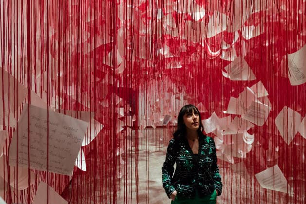 February 16, 2026, London, England, United Kingdom: A staff member looks at Letters of Thanks , 2026, by Chiharu Shiota during a photocall at the Hayward Gallery ahead of the first major solo London exhibition titled Threads of Life of the Berlin-based Japanese artist. London United Kingdom - ZUMAs371 20260216_zip_s371_017 Copyright: xWiktorxSzymanowiczx