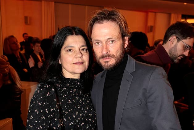 Jasmin Tabatabai and Andreas Pietschmann at the award ceremony of the Order of the Chevalier for Art and Literature during the Berlinale Soiree Francaise du Cinema at the French Embassy on February 16, 2026 in Berlin Berlinale Soiree Francaise 2026 Award Ceremony of the Order of the Chevalier