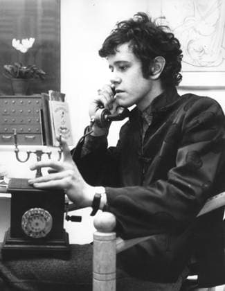 Singer Songwriter Donovan 1946 - Oct 2, 1970 - London, England, United Kingdom - DONOVAN (born DONOVAN PHILIPS LEITCH, 10 May 1946) is a Scottish singer, songwriter and guitarist. He developed an eclectic and distinctive style that blended folk, jazz, pop, psychedelia, and world music (notably calypso). PICTURED - Maida Vale, Paddington, London, England - Singer musician DONOVAN, 19, relaxing at Maida Vale home on his old fashioned crank telephone. Copyright: xKEYSTONExPicturesx