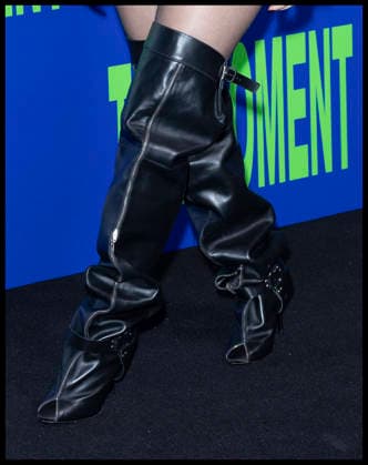 . 17 02 2026. London, United Kingdom. Close up of the boots worn by British singer, songwriter and actress Charli xcx at The Moment premiere in London.  xStephenxLockx xi-Imagesx IIM-26574-0014