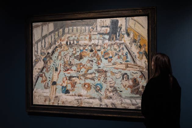 Four Masterpieces from the Lewis Collection on dispaly at Sotheby s New York A visitor looks at Children’s Swimming Pool, 11 o clock Saturday Morning, August by Leon Kossoff from Four Masterpieces from the Lewis Collection to be auction in London on display during press preview at Sotheby s New York, NY on February 17, 2026. New York New York United States Copyright: LevxRadin