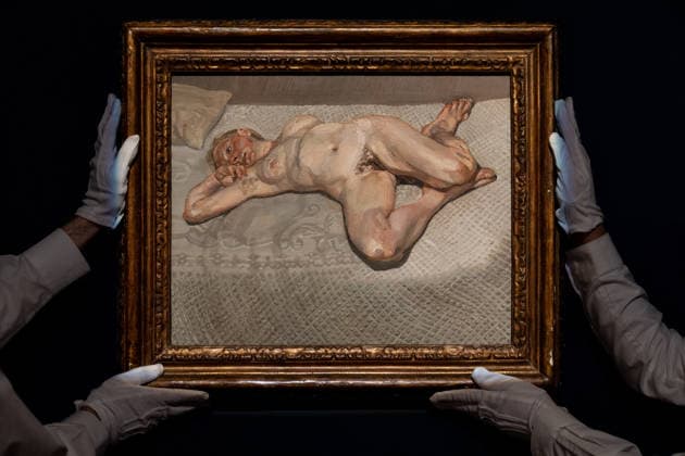 Four Masterpieces from the Lewis Collection on dispaly at Sotheby s New York An auction assistant poses with Blond Girl on a Bed by Lucian Freud from Four Masterpieces from the Lewis Collection to be auction in London on display during press preview at Sotheby s New York, NY on February 17, 2026. New York New York United States Copyright: LevxRadin
