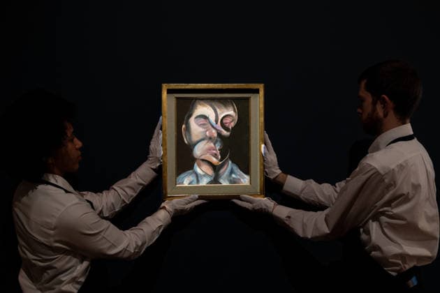 Four Masterpieces from the Lewis Collection on dispaly at Sotheby s New York An auction assistant poses with Self-Portrait by Francis Bacon from Four Masterpieces from the Lewis Collection to be auction in London on display during press preview at Sotheby s New York, NY on February 17, 2026. New York New York United States Copyright: LevxRadin