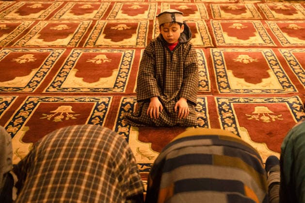 First Tarawih Prayers of Ramadan In Kashmir, India - 18 Feb 2026 A Kashmiri Muslim boy offers the first Tarawih prayers to mark the start of the holy month of Ramadan at the Jamia Masjid, also known as the Grand Mosque, in Downtown Srinagar. Ramadan is the ninth month of the Islamic lunar calendar, during which Muslims worldwide fast from dawn to sunset, refraining from food, drink and marital intimacy as a form of spiritual reflection, prayer and charity. Muslims believe the Quran was first revealed to the Prophet Muhammad during this month. Srinagar India Copyright: xFaisalxBashirx xSOPAxImagesx 3TarawihPrayers2026