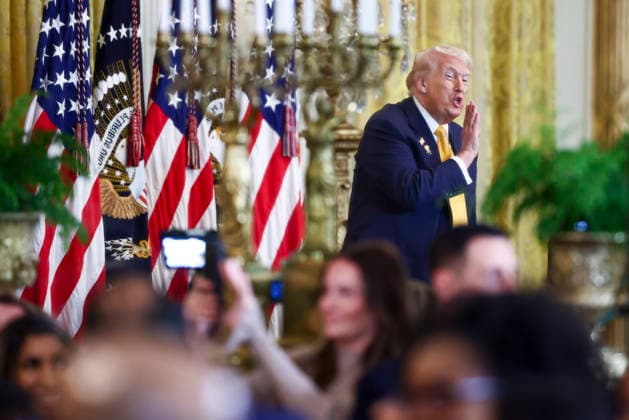 President Donald Trump speaks at a reception for Black History Month in the East Room of the White House in Washington, DC on Wednesday, February 18, 2026. The event comes less than two weeks after President Trump s Truth Social account shared a racist video of former President Barack Obama and former First Lady Michelle Obama.  WASP20260218102 JIMxLOxSCALZO