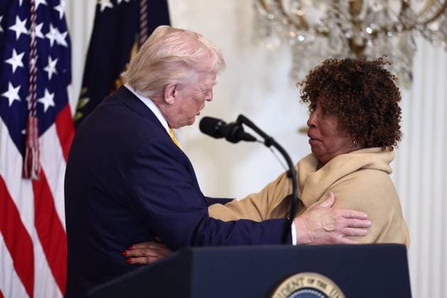 February 18, 2026, Washington, District Of Columbia, USA: United States President Donald Trump talks with DC resident Felicia Cook, who lost her grandson to gun violence, during a reception for Black History Month in the East Room of the White House in Washington, DC, USA, 18 February 2026. The event comes less than two weeks after President Trump™s Truth Social account shared a racist video of former President Barack Obama and former First Lady Michelle Obama Washington USA  - ZUMAs152 20260218_faa_s152_016 Copyright: xJimxLoScalzox-xPoolxviaxCNPx