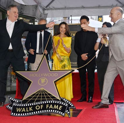 Actress Michelle Yeoh (C) reacts during an unveiling ceremony honoring her with the 2,836th star on the Hollywood Walk of Fame in Los Angeles on Wednesday, February 18, 2026.  LAP2026021801 JIMxRUYMEN