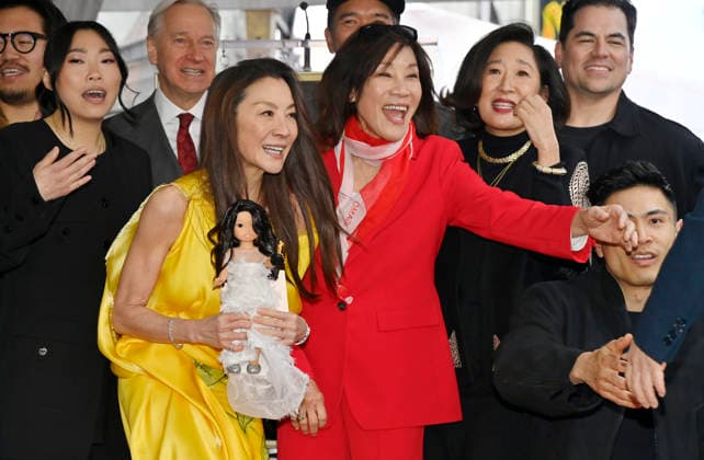 Actress Michelle Yeoh (L) is joined by actress Janet Yang (R) during an unveiling ceremony honoring her with the 2,836th star on the Hollywood Walk of Fame in Los Angeles on Wednesday, February 18, 2026.  LAP2026021817 JIMxRUYMEN