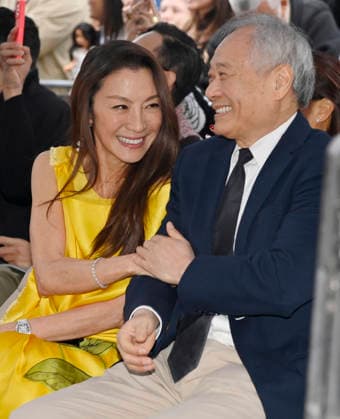 Actress Michelle Yeoh (L) and director And Lee react to comments during an unveiling ceremony honoring her with the 2,836th star on the Hollywood Walk of Fame in Los Angeles on Wednesday, February 18, 2026.  LAP2026021823 JIMxRUYMEN