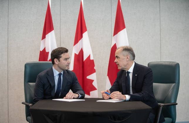 February 18, 2026, Edmonton, Ab, CANADA: Prime Minister Mark Carney and MP Matt Jeneroux meet in Edmonton after Jeneroux crossed the floor to the Liberals on Wednesday, Feb. 18, 2026. Edmonton CANADA  - ZUMAc35_ 20260218_zaf_c35_249 Copyright: xJasonxFransonx