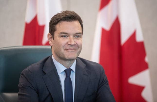 February 18, 2026, Edmonton, Ab, CANADA: MP Matt Jeneroux meets with Prime Minister Mark Carney in Edmonton after crossing the floor to the Liberals on Wednesday, Feb. 18, 2026. Edmonton CANADA  - ZUMAc35_ 20260218_zaf_c35_252 Copyright: xJasonxFransonx