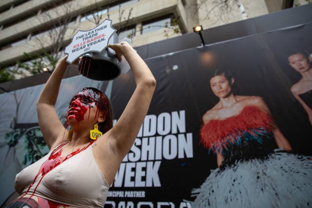 PETA Protest London Fashion Week in London - 19 Feb 2026 A PETA activist dressed as a pregnant cow and covered in fake blood, holds a placard above her head during a demonstration outside London fashion week. Members of PETA (People for the Ethical Treatment of Animals) held a demonstration outside London Fashion Week’s New Gen Space, drawing attention to the billions of animals killed annually for their skins. During the protest, a pregnant activist—wearing earrings resembling the identification tags used on cows and with an unborn calf painted on her stomach—drenched herself in red paint symbolizing blood. The demonstration conveyed the message: The Leather Trade Kills Babies — Wear Vegan. London United Kingdom Copyright: xJamesxWilloughbyx xSOPAxImagesx JWILLOUGHBY_2354