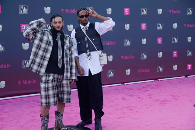 (L-R) Aka The Darknight and Dominicanos Saso of Planta Industrial walk the red carpet at the Univision 2026 38th edition of Premio Lo Nuestro award show at the Kaseya Center in Miami, Florida, on Thursday, February 19, 2026.  MIA20260219222 GARYxIxROTHSTEIN
