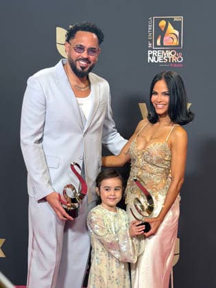 Dominican singer Natti Natasha (R) and his boyfriend Raphy Pina (L) and his daugther Vida (c) pose at the red carpet of Lo Nuestro Awards (focus in the Latin music) gala held in Miami, Florida, USA on 19 February 2026. Red carpet of Lo Nuestro Awards (focus in the Latin music) gala !ACHTUNG: NUR REDAKTIONELLE NUTZUNG!  Copyright: xAliciaxCivitax USA8591 20260220-55019458974_1