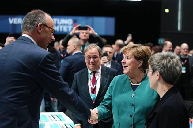 Stuttgart, Baden-Württenberg, Deutschland, 20.02.2026: Messehalle: 38. Bundesparteitag der CDU Deutschlands: Parteichef und Bundeskanzler Friedrich Merz (CDU) und Altkanzlerin Angela Merkel (Foto: Kay Nietfeld, Pool) *** Stuttgart, Baden Württenberg, Germany, 20 02 2026 Exhibition Hall 38 Federal Party Conference of the CDU Germany Party leader and Federal Chancellor Friedrich Merz CDU and former Chancellor Angela Merkel Photo Kay Nietfeld, Pool Copyright: xKayxNietfeld,xPool dtsxNachrichtenagenturx dts_107295