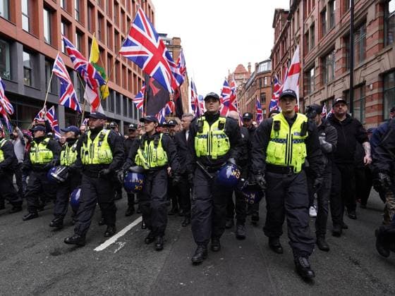 Britain First March For Remigration in Manchester MANCHESTER , UNITED KINGDOM - FEBRUARY 21: Police clash with protestors during an anti-migration protest as they demand mass deportation in Manchester, United Kingdom, on 21 February, 2026. Loannis Alexopoulos Anadolu Manchester United Kingdom. Editorial use only. Please get in touch for any other usage.  Copyright: x2026xAnadoluxLoannisxAlexopoulosx