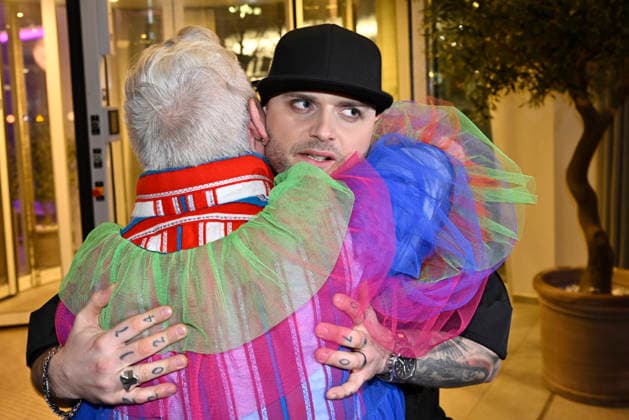 MALMÖ, SWEDEN 20260221 Chris Adam, singer of Smash Into Pieces, hugs a fan at the after party after round 4 of Melodifestivalen 2026 in Malmö Arena on Saturday MALMÖ SWEDEN x50090x  Copyright: xJohanxNilsson TTx MELODIFESTIVALEN 2026 MALMÖ ZMzwwBh8BCU
