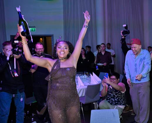 MALMÖ, SWEDEN 20260221 Cimberly celebrates the final place with champagne at the after party after round 4 of Melodifestivalen 2026 in Malmö Arena on Saturday MALMÖ SWEDEN x50090x  Copyright: xJohanxNilsson TTx MELODIFESTIVALEN 2026 MALMÖ L8bhmOQu_9Y